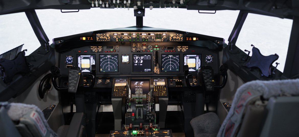 empty airplane cockpit with electronic flying navigation panel control command with buttons lever dashboard no people aircraft cabin throttle engine takeoff - Type Rating - DGCA India